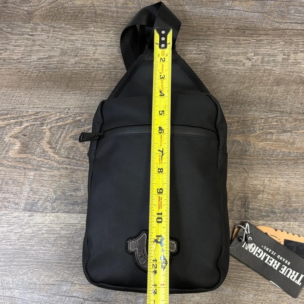 True Religion “Jody” Sling Bag | Black Logo Lined Crossbody